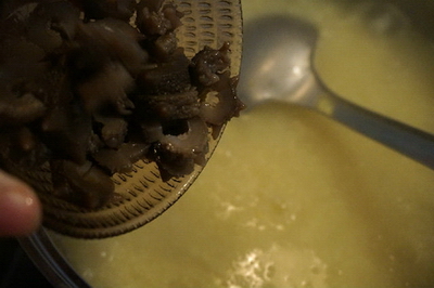 海参小米粥的做法步骤6